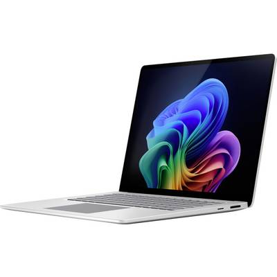 Un laptop con un motivo astratto e colorato sullo schermo. Il dispositivo è leggermente inclinato, in modo che la tastiera sia visibile.