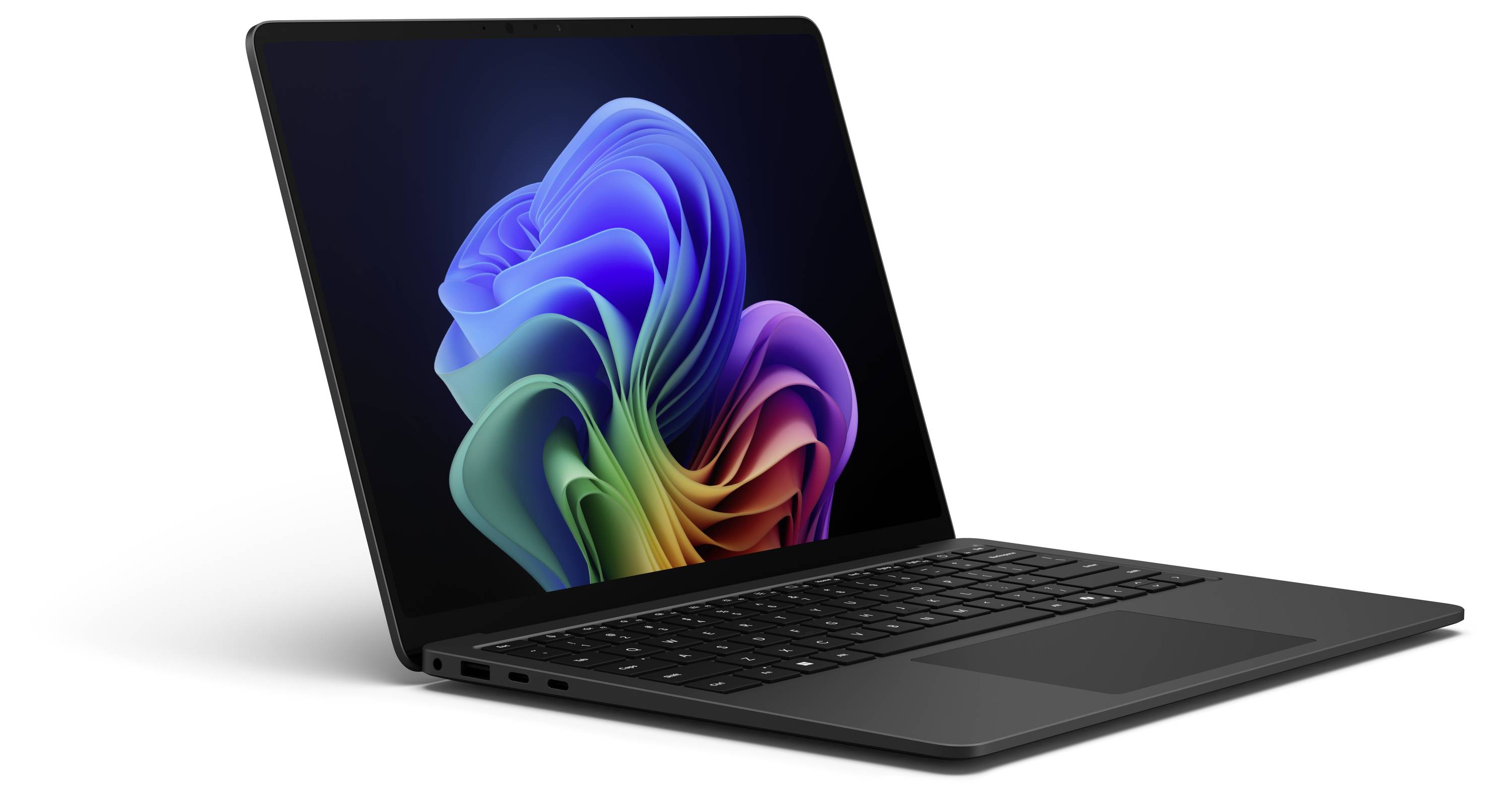 Un laptop aperto con involucro nero mostra uno sfondo colorato sullo schermo.
