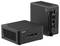 Un piccolo mini PC nero con più porte USB e fessure di ventilazione, posizionato su un tavolo.