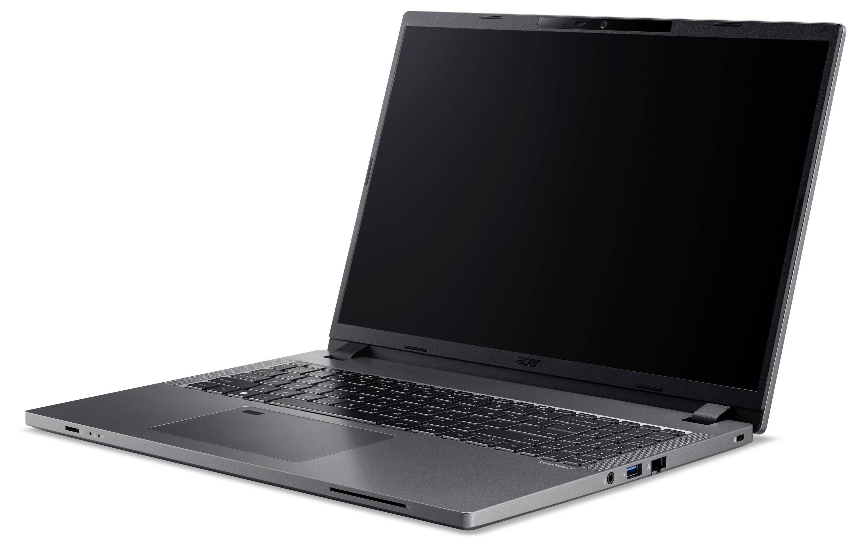 Un laptop grigio con il display aperto, la tastiera ben visibile. Sullo sfondo non si distingue nulla, il che rafforza il focus.