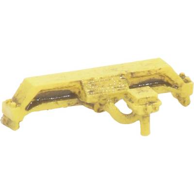Parte in plastica gialla, consumata, con texture integrata. La forma ricorda un componente tecnico o un pezzo di modellismo.
