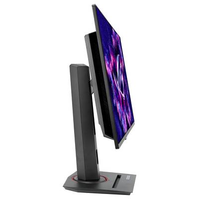 Un monitor per computer nero e grigio, fotografato di lato, mostra un pattern astratto blu e rosa sullo schermo.