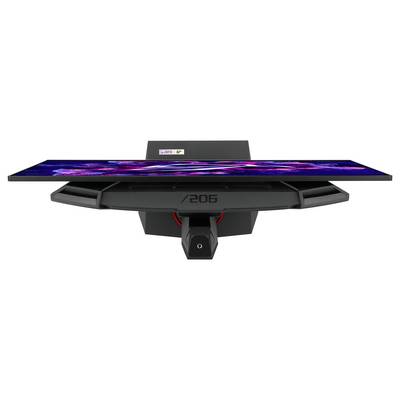 Un monitor da gaming mostrato frontalmente e dal basso, con schermo illuminato in colori vivaci e fessure di ventilazione sui lati.