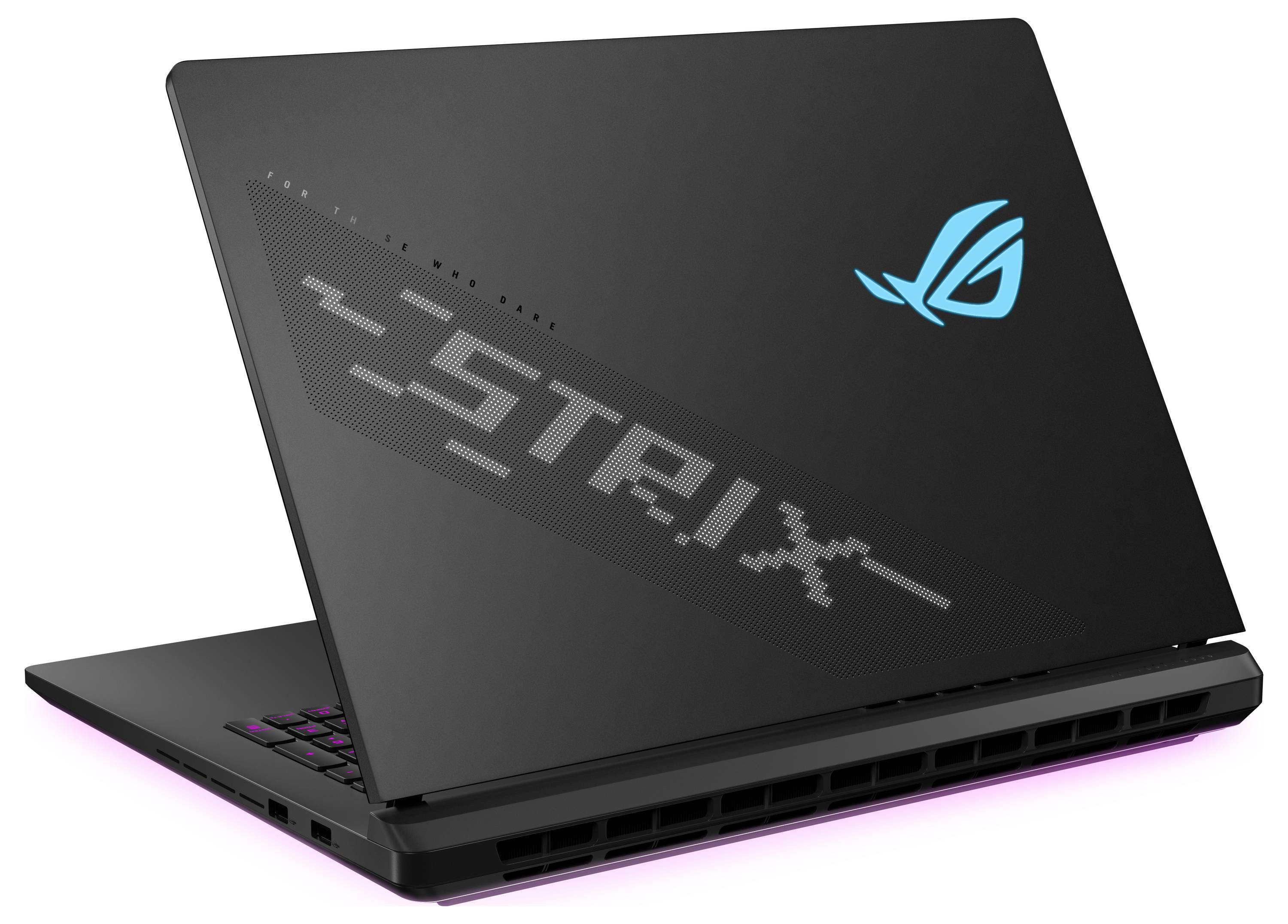 Un laptop nero Asus con logo illuminato e tastiera retroilluminata. Il nome del modello 'STRIX' è chiaramente visibile sul retro.