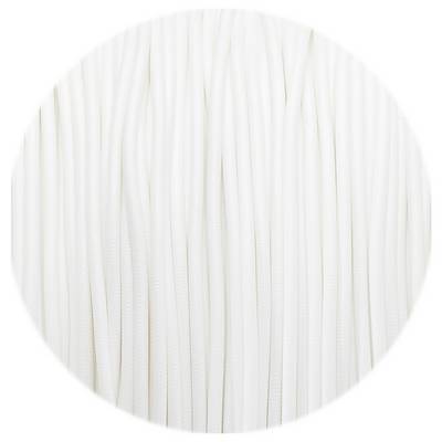 Immagine circolare che mostra un cavo o materiale tubolare bianco densamente raggruppato in disposizione verticale.