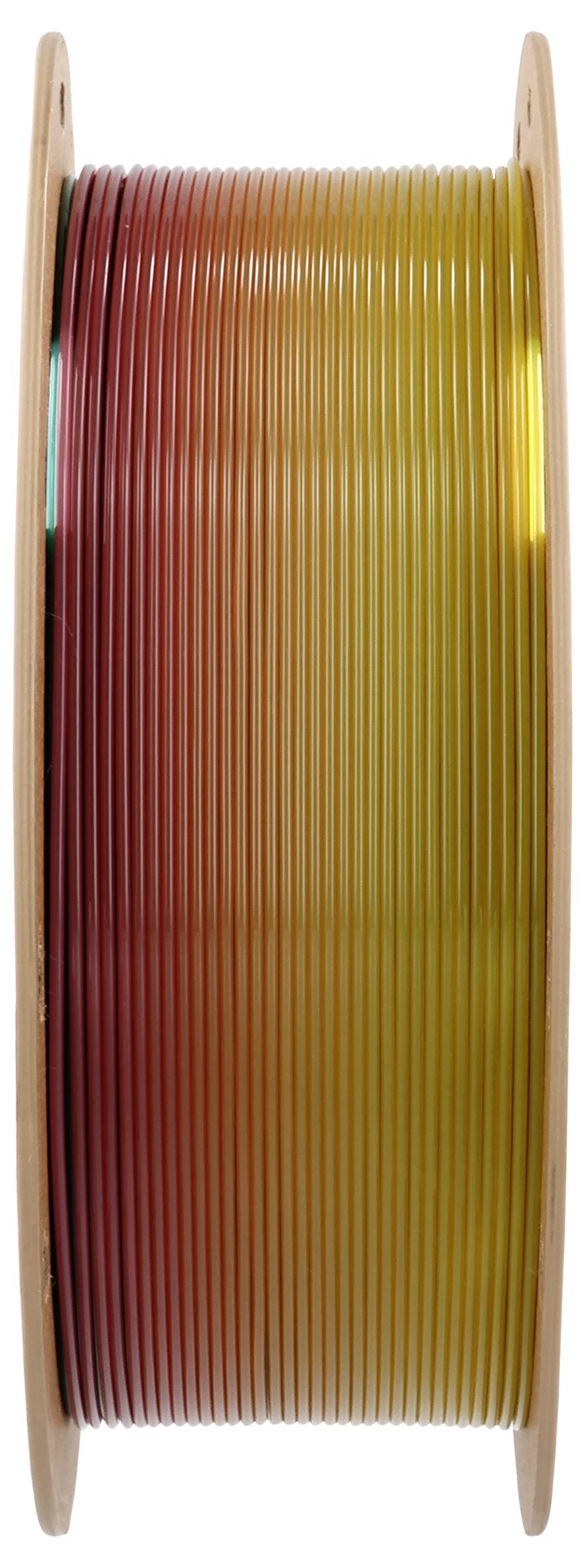 Un rotolo di filamento per stampante 3D multicolore che sfuma dal rosso al marrone fino al giallo.