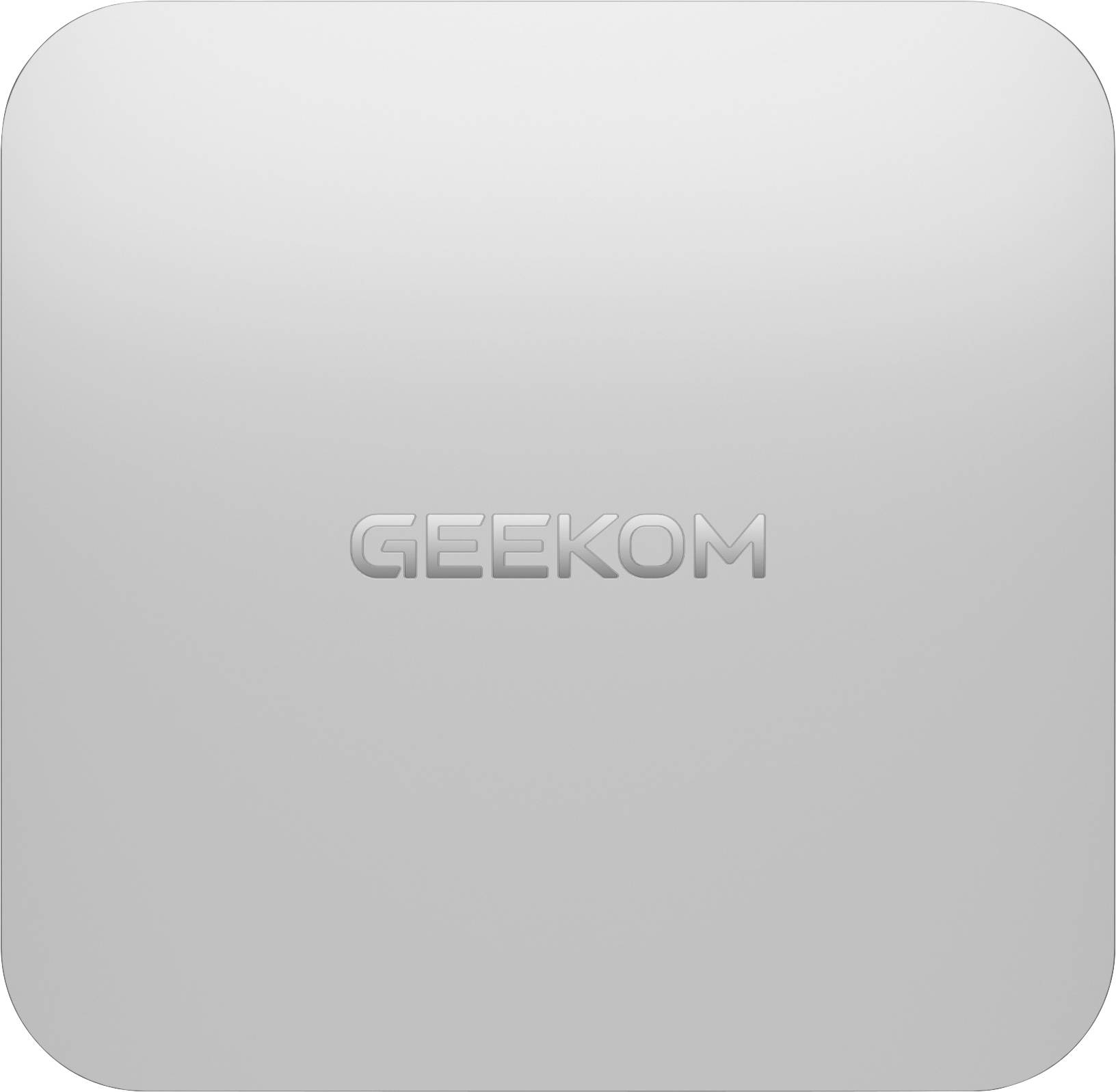 Un contenitore argentato con la parola 'GEEKOM' incisa al centro, dal design semplice e minimale.