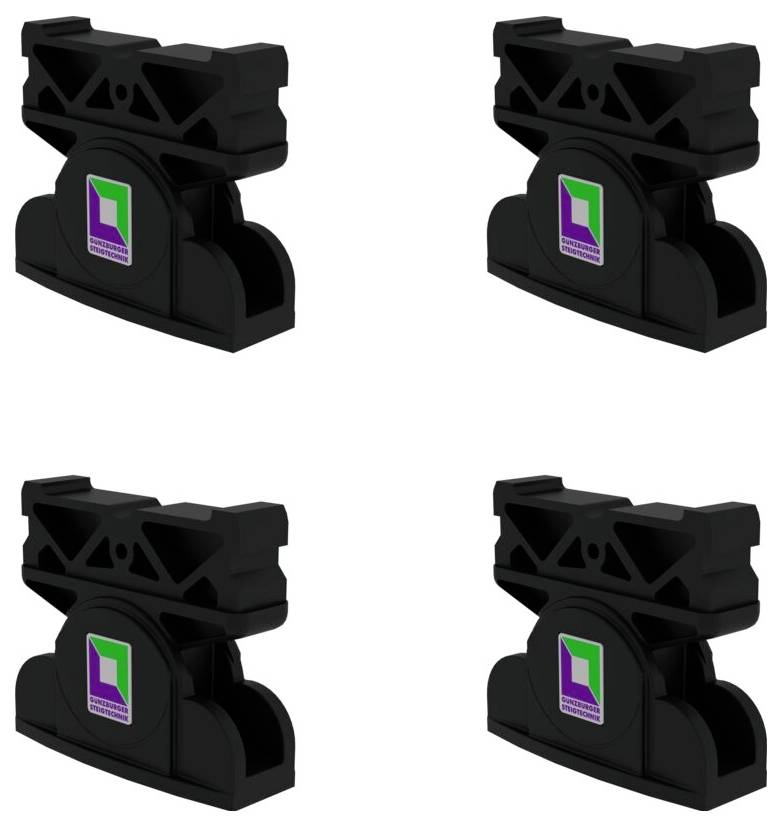 Quattro supporti di plastica nera con etichetta viola-verde. Disposti in un modello a griglia. Scopo o utilizzo non chiaro.