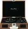 Un giradischi marrone aperto in un design a valigetta con la scritta 'Classic Phono' all'interno del coperchio.