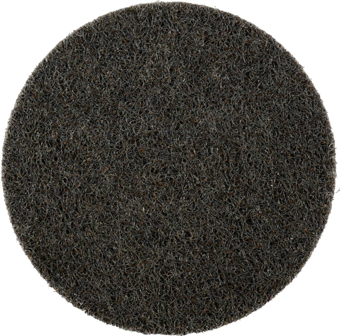 Un pad circolare di colore scuro con una struttura ruvida. Viene utilizzato per la pulizia o la levigatura di superfici.