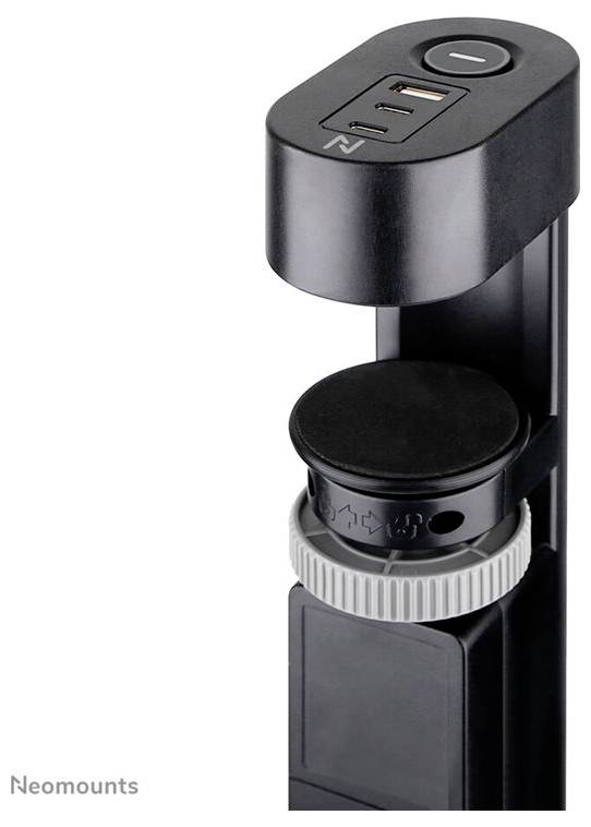Dock nero per scrivania con porte USB e elemento antiscivolo rotondo, da fissare ai bordi del tavolo.