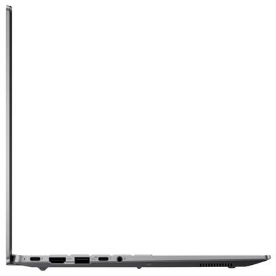Vista laterale sinistra di un laptop sottile e moderno con il coperchio aperto, che mostra le porte tra cui USB, HDMI e jack audio, evidenziando le sue opzioni di connettività.