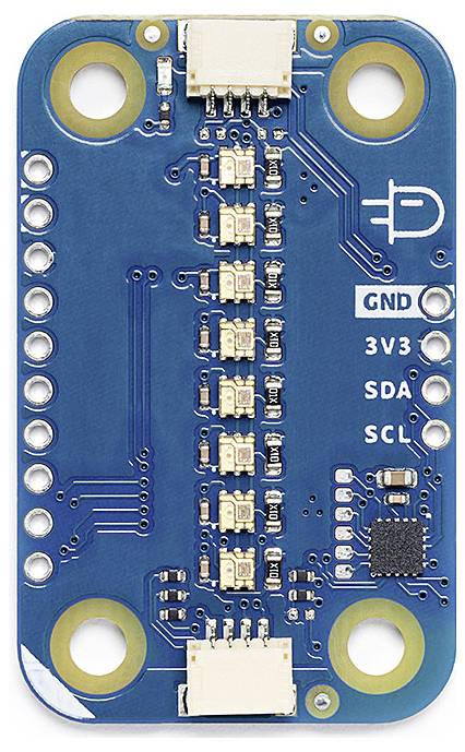 Scheda elettronica con più connettori digitali e un microchip, utilizzata per connessioni e controlli elettronici.