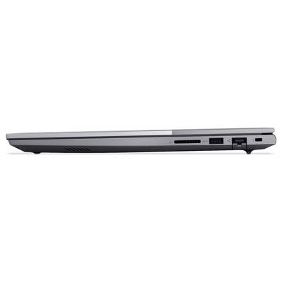Un laptop argento chiuso visto di lato, che mostra varie porte e fessure di ventilazione.