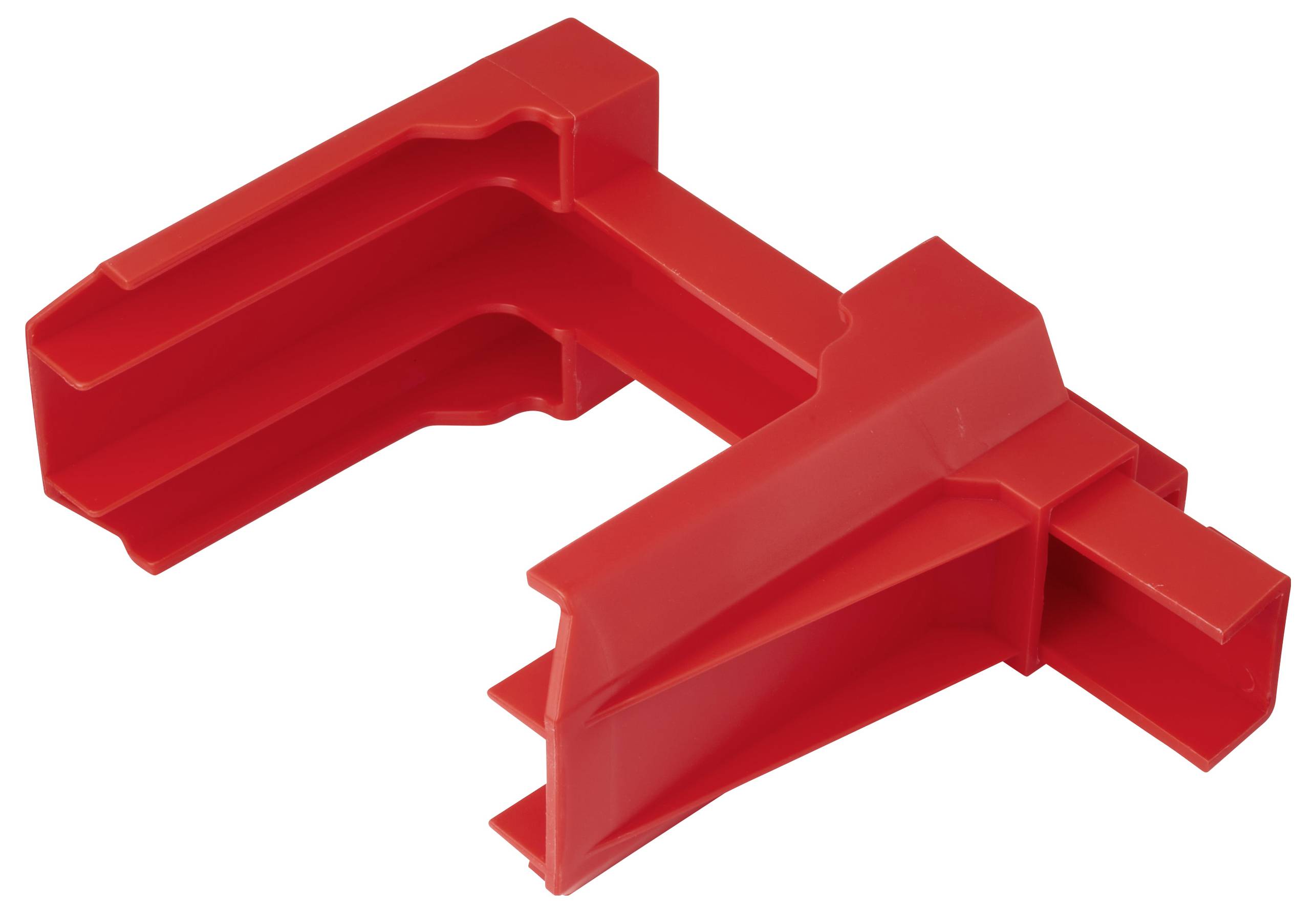 Un fermaglio di plastica rossa con un design a forma di T, dotato di fessure e canali, probabilmente utilizzato per fissare o organizzare cavi o materiali.