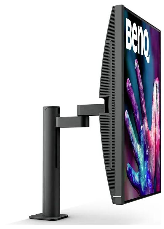 Un monitor per computer con il logo 'BenQ' sul retro, che mostra un'impronta di mano colorata sullo schermo, montato su un braccio regolabile.