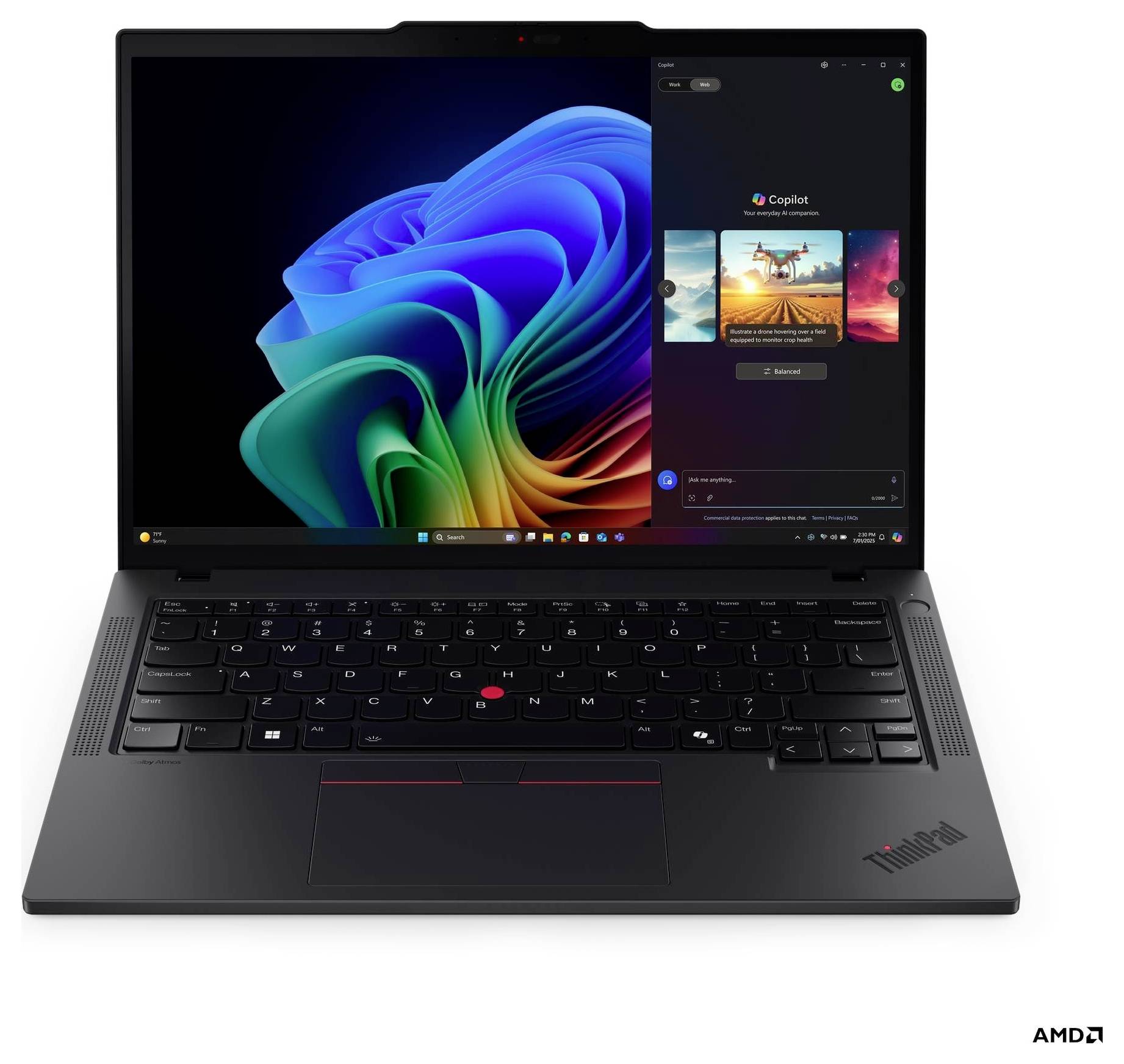 Un laptop nero mostra un display vorticoso e colorato, con una finestra dell'applicazione aperta di lato.