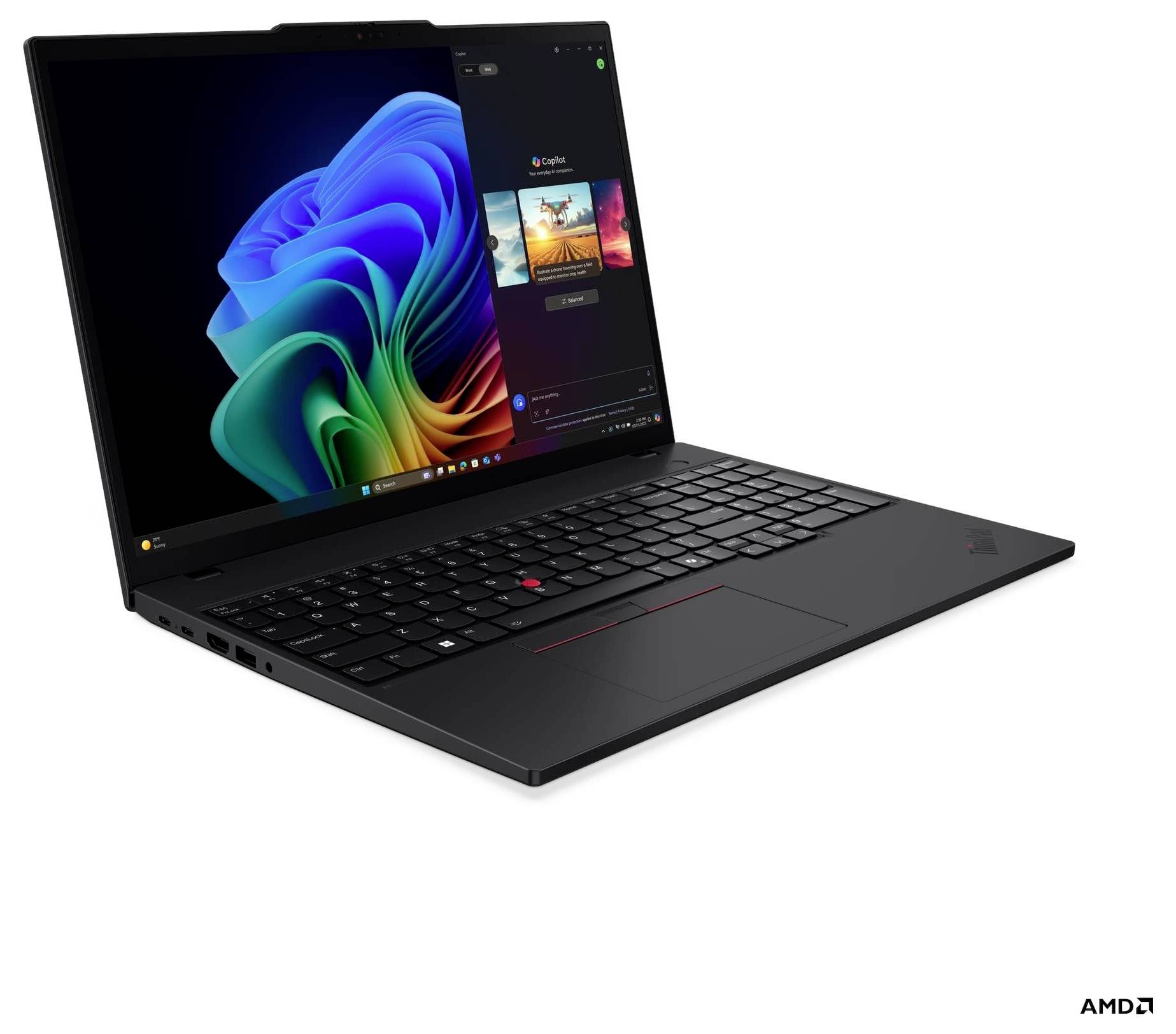Un elegante laptop nero con un display di arte digitale vibrante sullo schermo, dotato di una webcam visibile e una tastiera, con il marchio AMD.