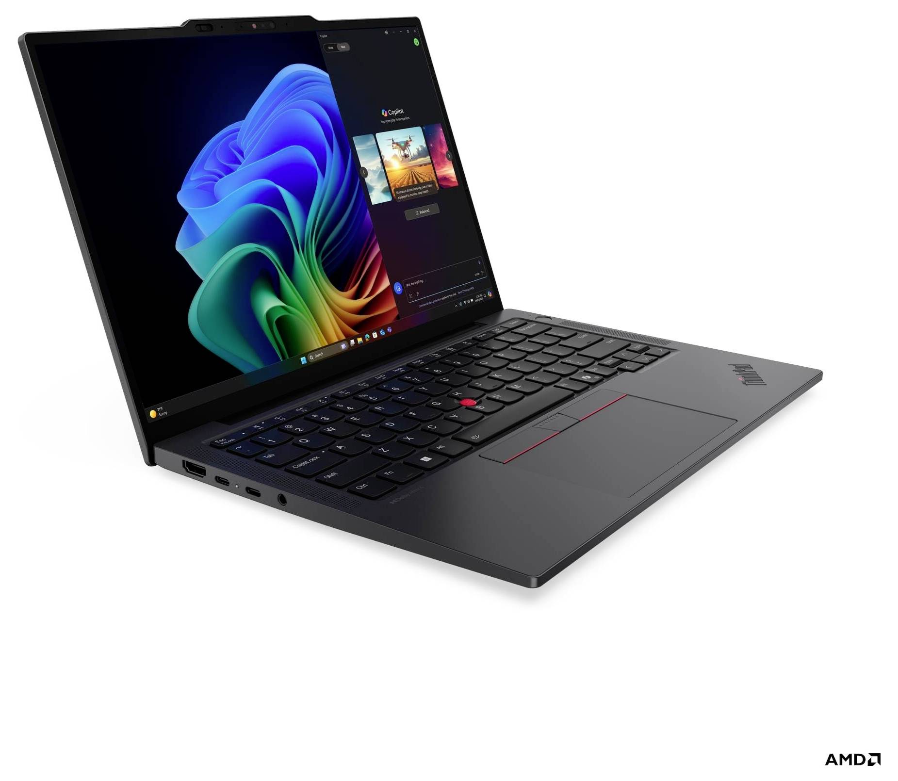 Un elegante laptop nero con uno schermo illuminato che mostra grafica colorata e un'interfaccia utente, che presenta una vista laterale della tastiera.