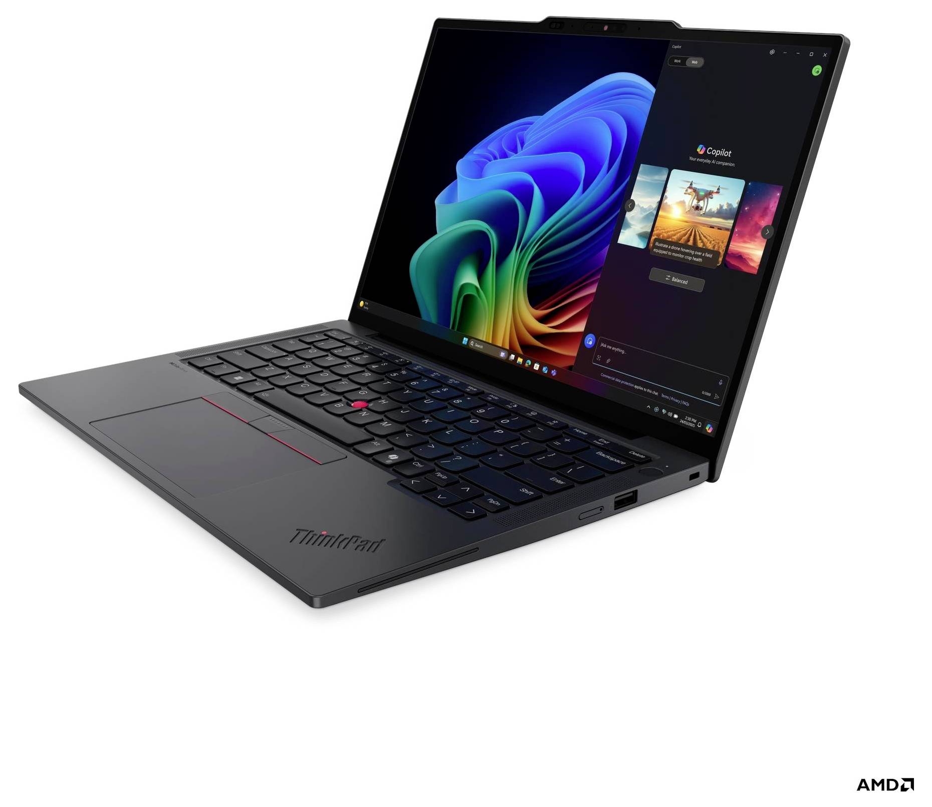 Un laptop con un display variopinto che mostra un desktop digitale e una barra laterale con applicazioni aperte; tastiera e touchpad visibili.