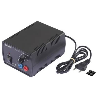 Un alimentatore Voltcraft CSR-320 nero con interruttore on/off, manopola di regolazione della tensione e terminali di uscita rossi e blu. Include un cavo di alimentazione.