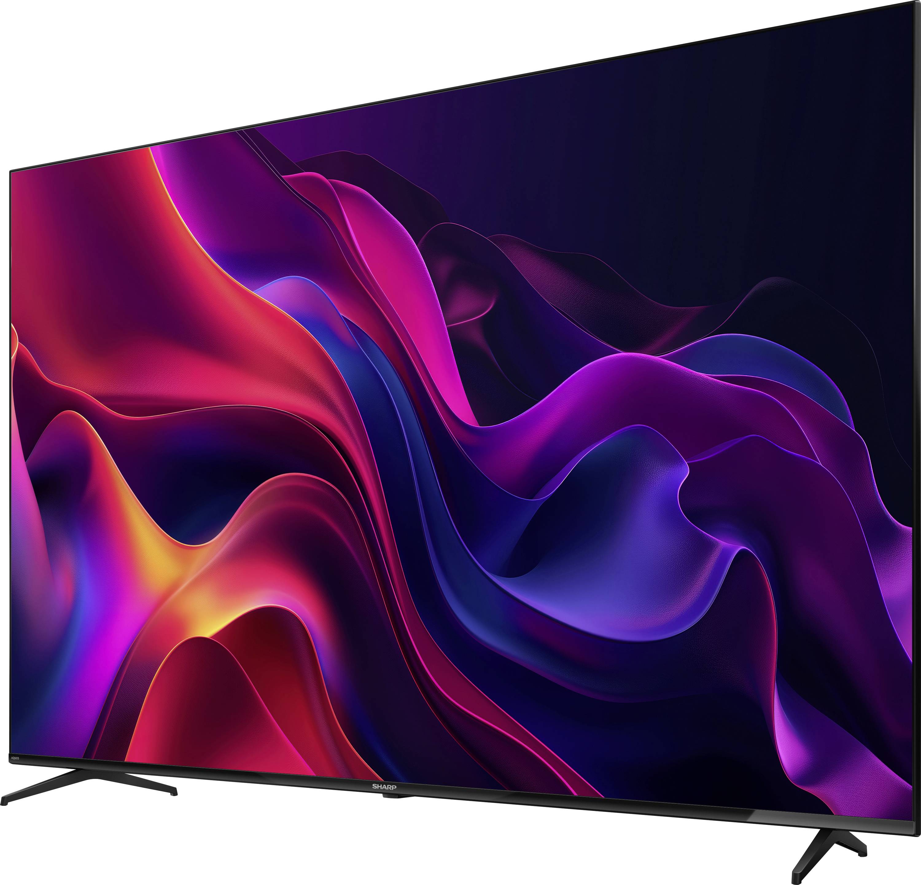 Un televisore a schermo piatto che mostra onde astratte vibranti in tonalità di rosso, viola e blu, creando un effetto visivo dinamico e colorato.