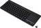 Una tastiera wireless nera con touchpad integrato e ricevitore USB, che mostra un design compatto adatto a un utilizzo versatile.