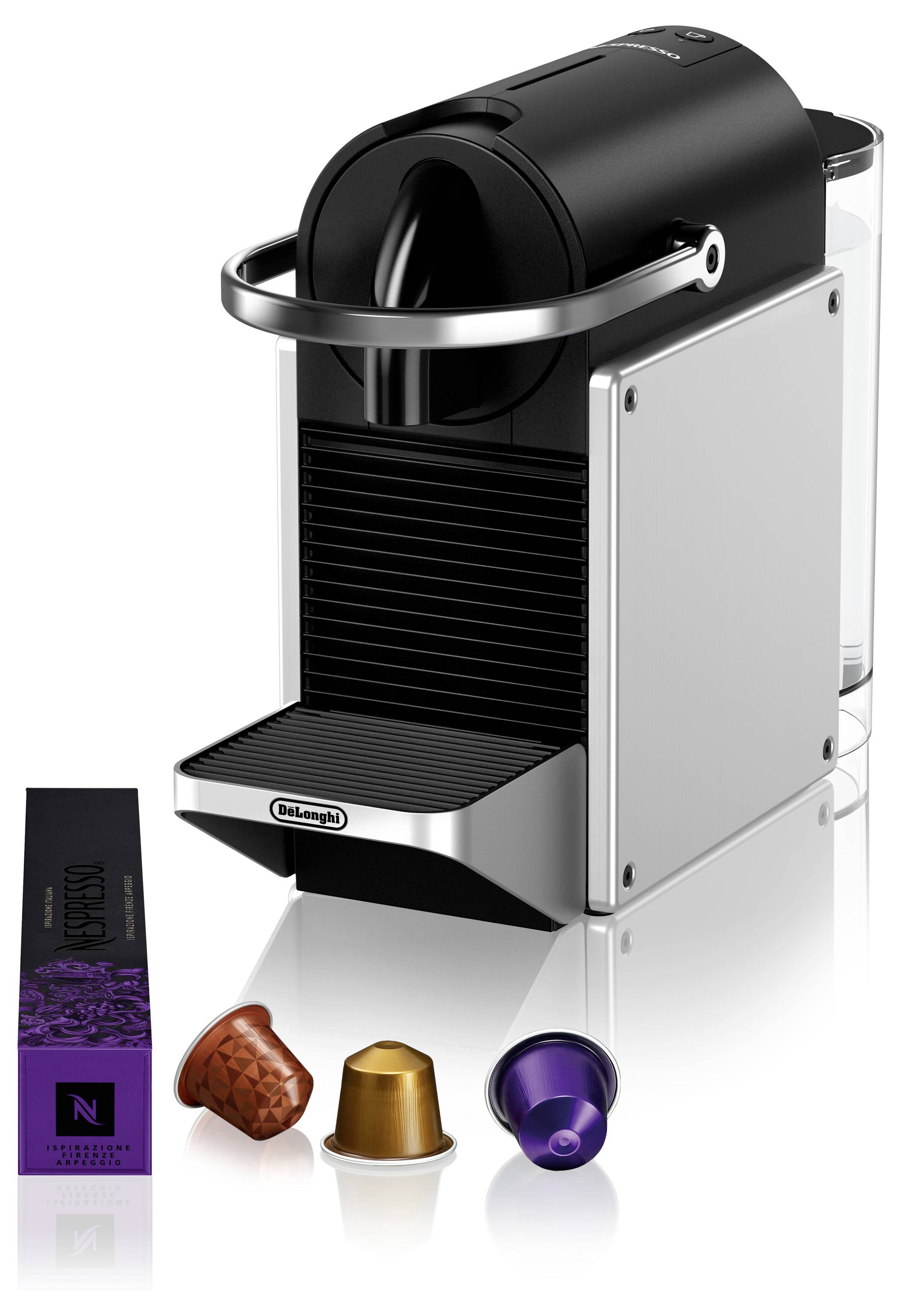 Una macchina da caffè Nespresso con tre capsule davanti: una marrone, una dorata e una viola.