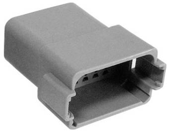 Un connettore elettrico rettangolare grigio in plastica con cinque punti di contatto, probabilmente utilizzato per inserirsi in un socket compatibile.