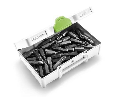 Un contenitore bianco aperto contenente vari punte da trapano nere con un fermo verde in alto, etichettato 'FESTOOL.'