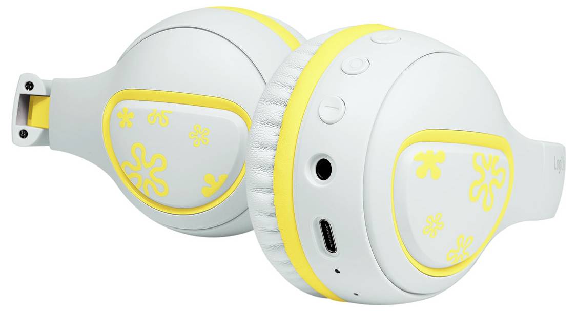 Cuffie wireless bianche e gialle con motivi floreali, che mostrano i pulsanti di controllo e una porta di ricarica su un padiglione auricolare.