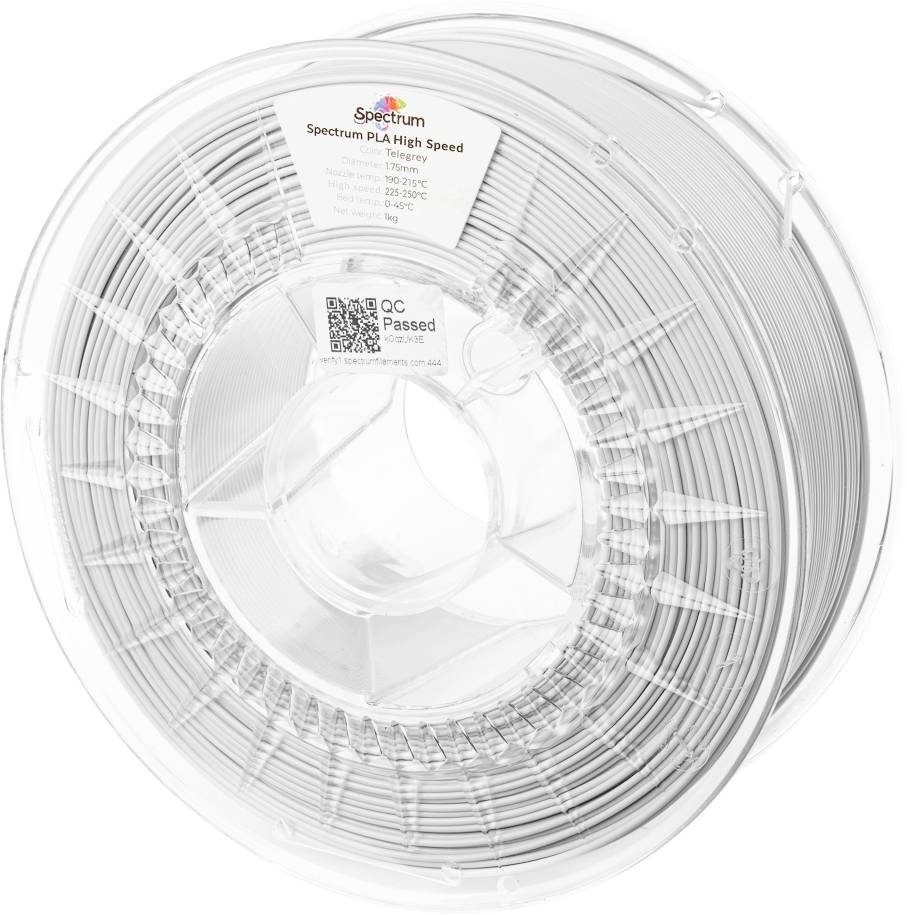 Bobina trasparente e chiara di filamento PLA Spectrum High Speed per stampa 3D, etichettata con specifiche tecniche e un adesivo 'QC Superato' visibile.