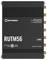 Dispositivo di rete 'Teltonika RUTM56', nero, etichettato 'Prodotto in Lituania' con connessioni porta sui lati, che mostra dettagli di alimentazione ed eSIM.