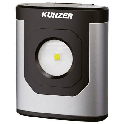 Una torcia da lavoro LED rettangolare in nero e argento con il marchio 'KUNZER' nella parte superiore, che presenta un'illuminazione centrale circolare e un design compatto.