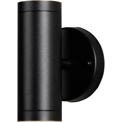 Un apparecchio illuminante nero, cilindrico, montato a parete con design verticale, adatto all'uso esterno.