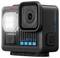 Una fotocamera d'azione compatta con obiettivo e base di montaggio, marchiata "GoPro LIT HERO", con un LED anteriore.