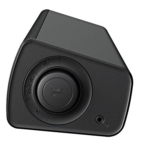 Un altoparlante multimediale nero con una manopola di controllo con etichette per l'accensione e il volume, dotato di una presa di ingresso sul lato.