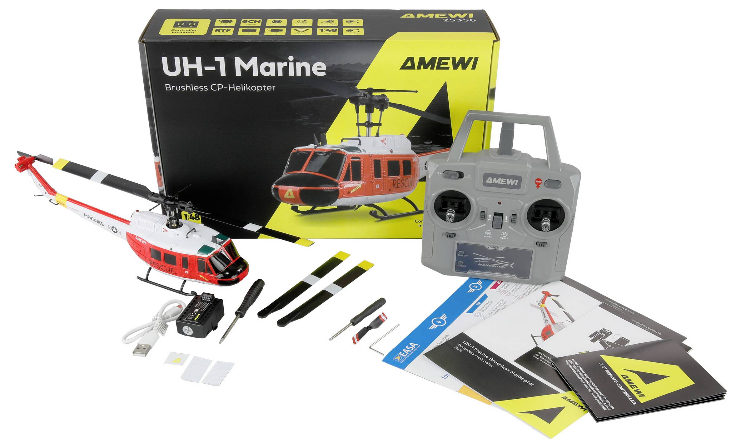 Kit di elicottero modello radiocomandato, etichettato 'UH-1 Marine' di Amewi, che include elicottero, manuale e accessori su uno sfondo bianco.