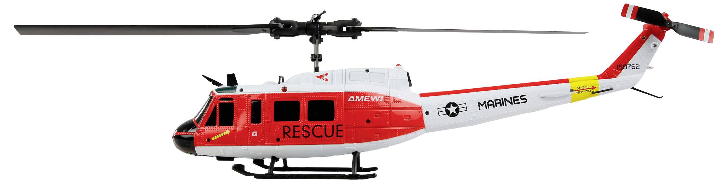 Un modello di elicottero con la scritta 'RESCUE' sul lato, schema di colori rosso e bianco, e l'emblema dei 'MARINES', utilizzato per missioni di ricerca e soccorso.