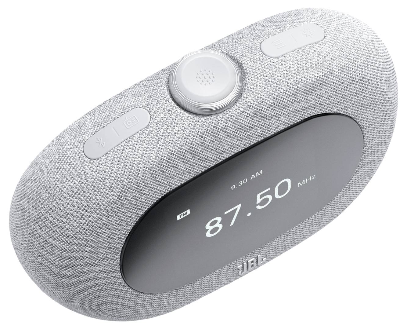 Una radio elegante, a forma ovale, con finitura in tessuto grigio, display digitale che mostra '87.50 MHz' e pulsanti sulla parte superiore per l'orologio e il controllo del volume.