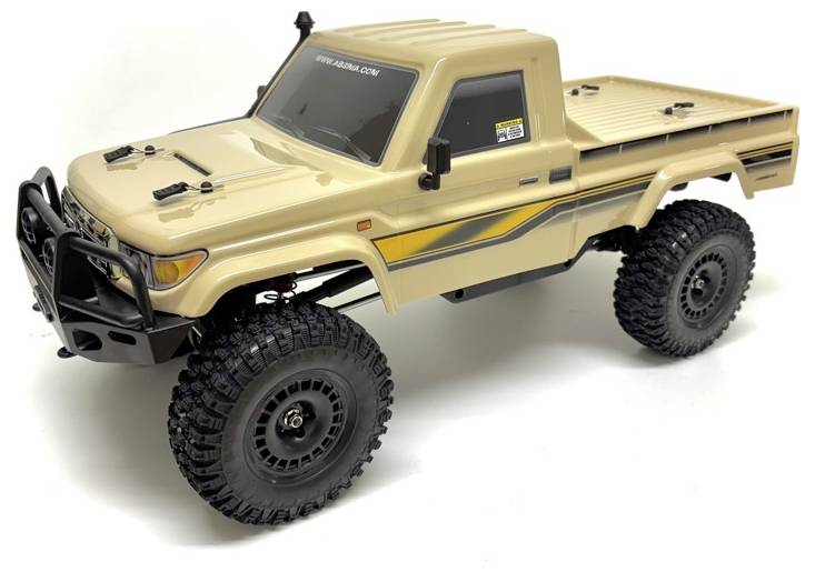 Un camion giocattolo fuoristrada beige con pneumatici grandi e un pianale. È progettato per assomigliare a un veicolo all-terrain robusto.