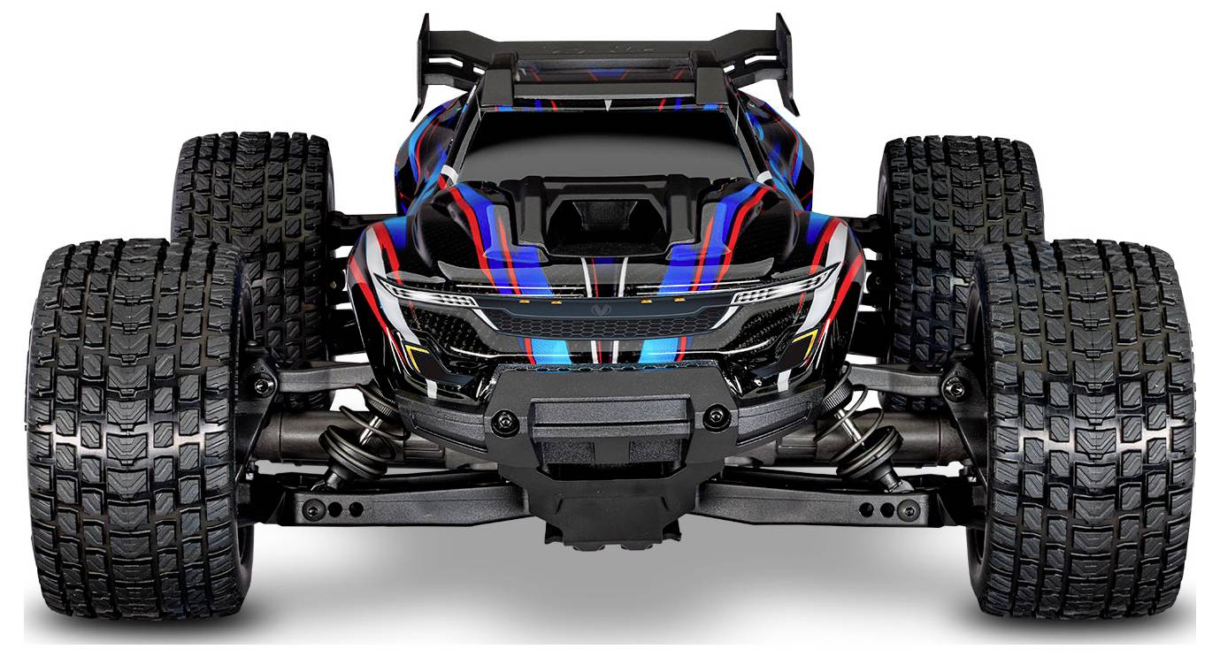 Un'auto telecomandata colorata con grandi pneumatici fuoristrada testurizzati, che mostra un design audace con strisce rosse, blu e nere.