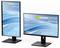 Due monitor che mostrano un design a onda blu. Il monitor di sinistra è verticale, quello di destra è orizzontale. Entrambi mostrano 'HANNspree EB241CJB' e dettagli '23.8'''.