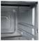 Interno di un forno in acciaio inossidabile che mostra pareti metalliche pulite ed elementi riscaldanti.