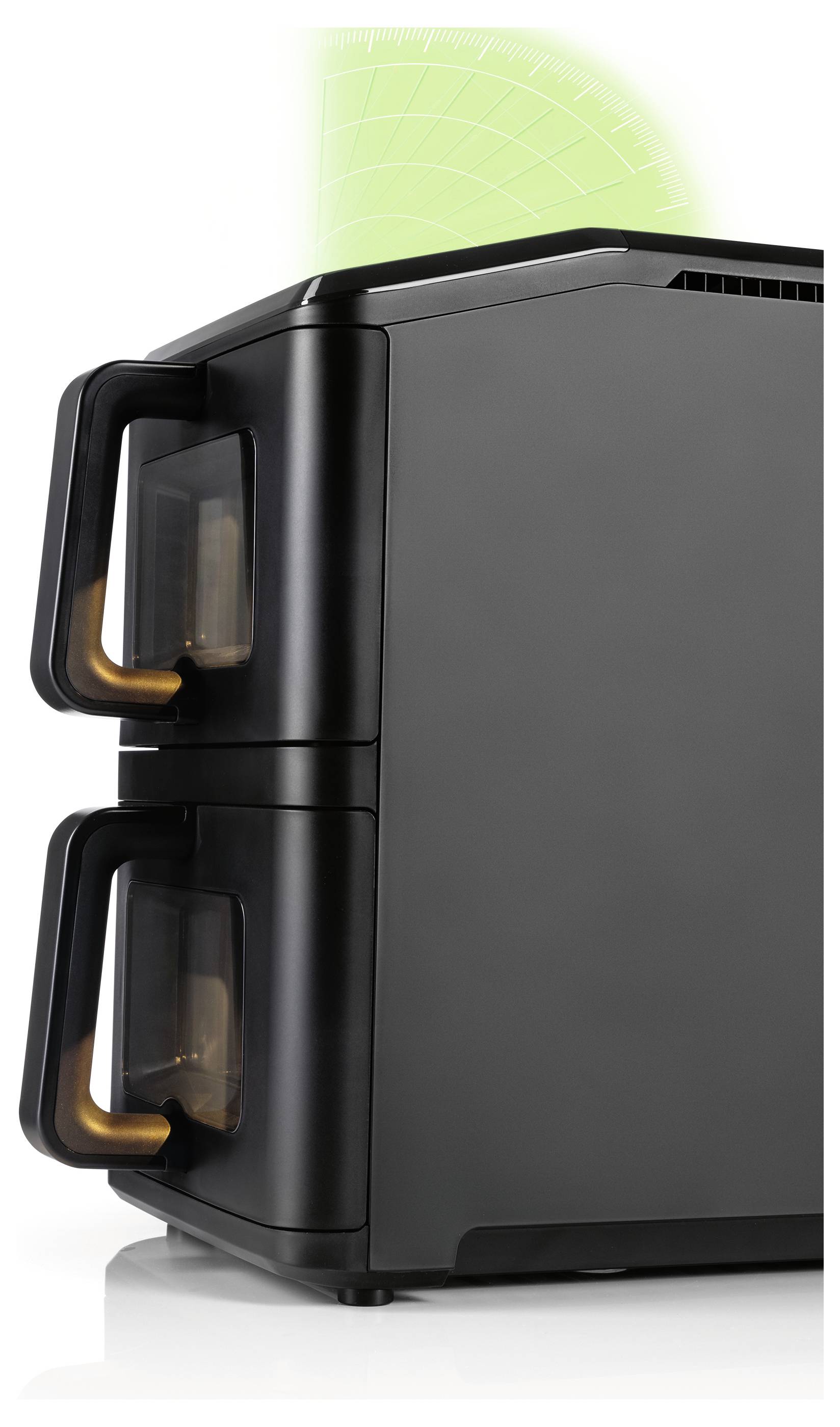 Un dispositivo elettronico nero con due scompartimenti sovrapposti, ciascuno dotato di una maniglia, è mostrato con uno schermo verde fluorescente simile a un radar sopra di esso.