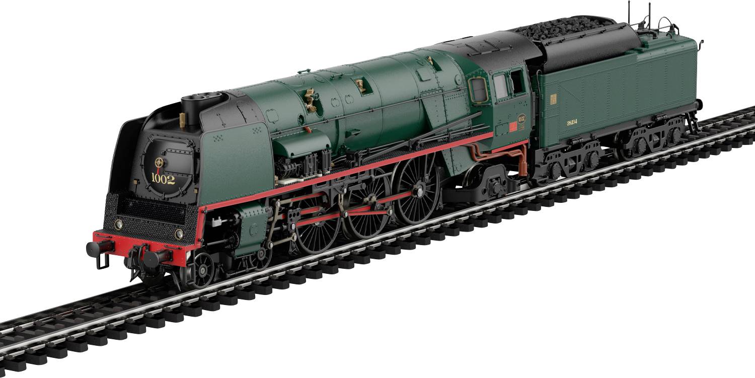Un modello dettagliato di una locomotiva a vapore verde su un tratto di binario ferroviario, che mette in evidenza un design intricato con ruote e caratteristiche del motore visibili.