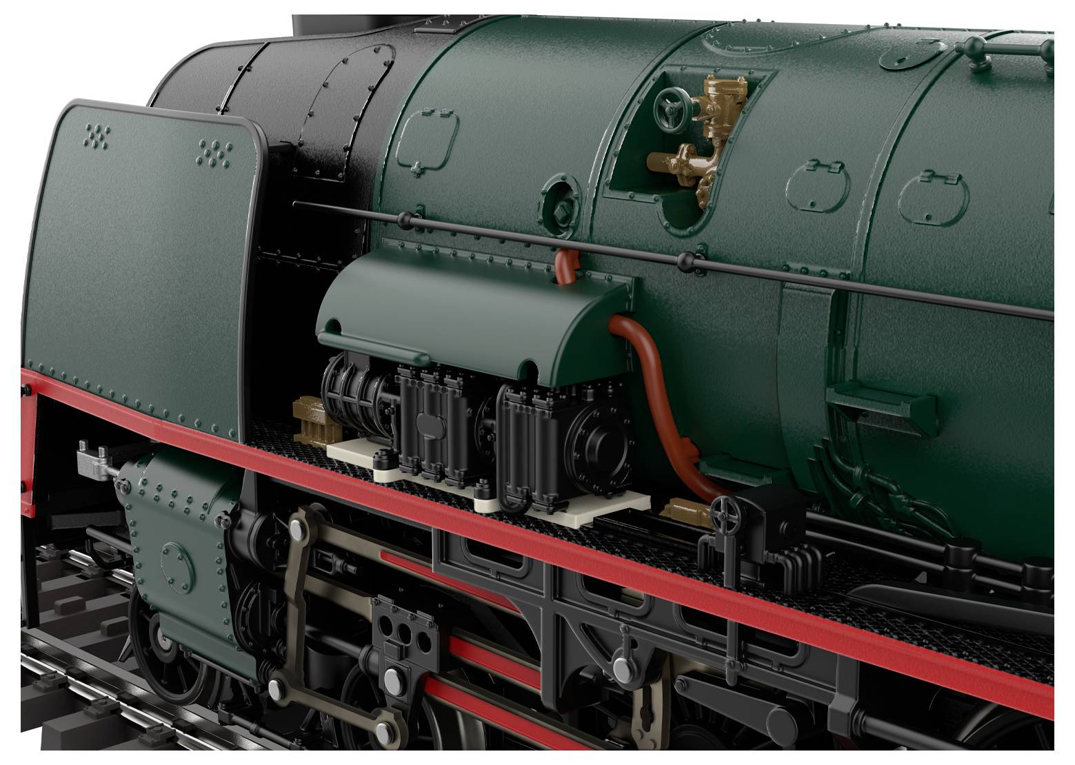 Una locomotiva a vapore in scala che mostra elementi dettagliati come la caldaia, i pistoni e le ruote su un binario, mettendo in evidenza il design ingegneristico.