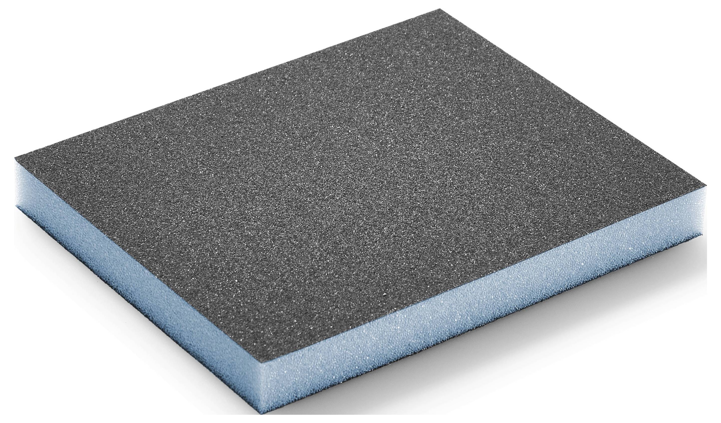 Un tappeto in schiuma rettangolare con uno strato superiore nero e uno strato inferiore blu, utilizzato per l'insonorizzazione o l'ammortizzazione.