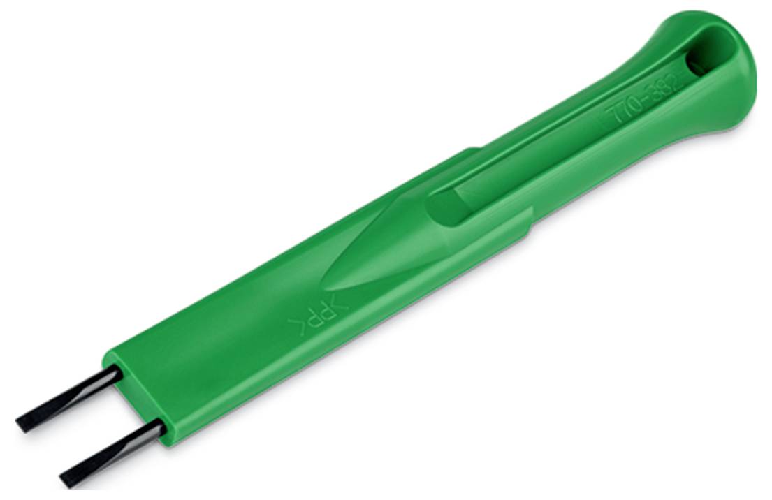 Un connettore industriale blu chiaro con porte di ingresso ("IN"), uscita ("OUT") e comune ("COM") etichettate sulla parte superiore.