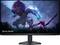Artwork del gioco 'Black Desert' su un monitor Alienware che mostra una creatura gigante e luminescente di colore blu che affronta un guerriero con una grande spada.
